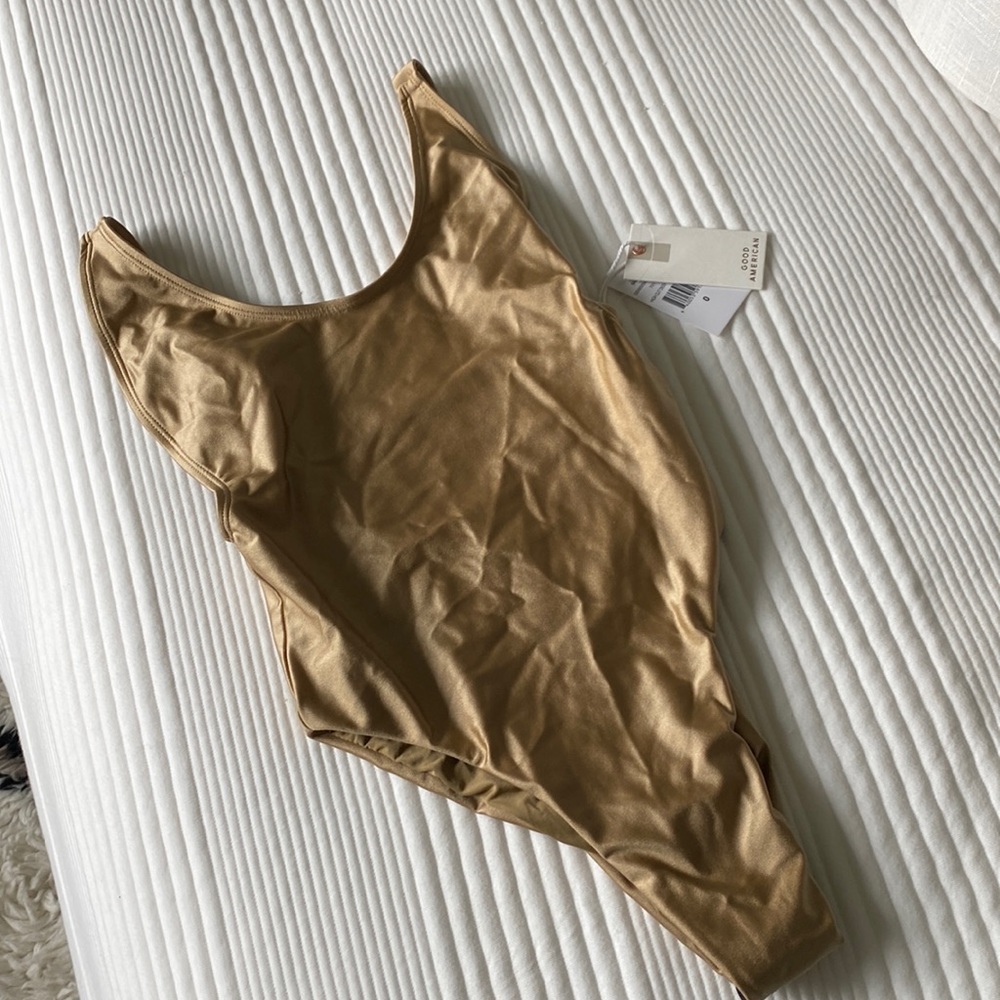 Good American gold/bronze one piece bathing suit. NWT! Open back! Size 0